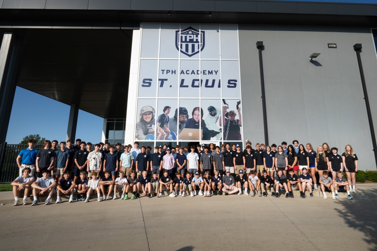 The 2026&ndash;27 academy class outside the Centene Community Ice Center