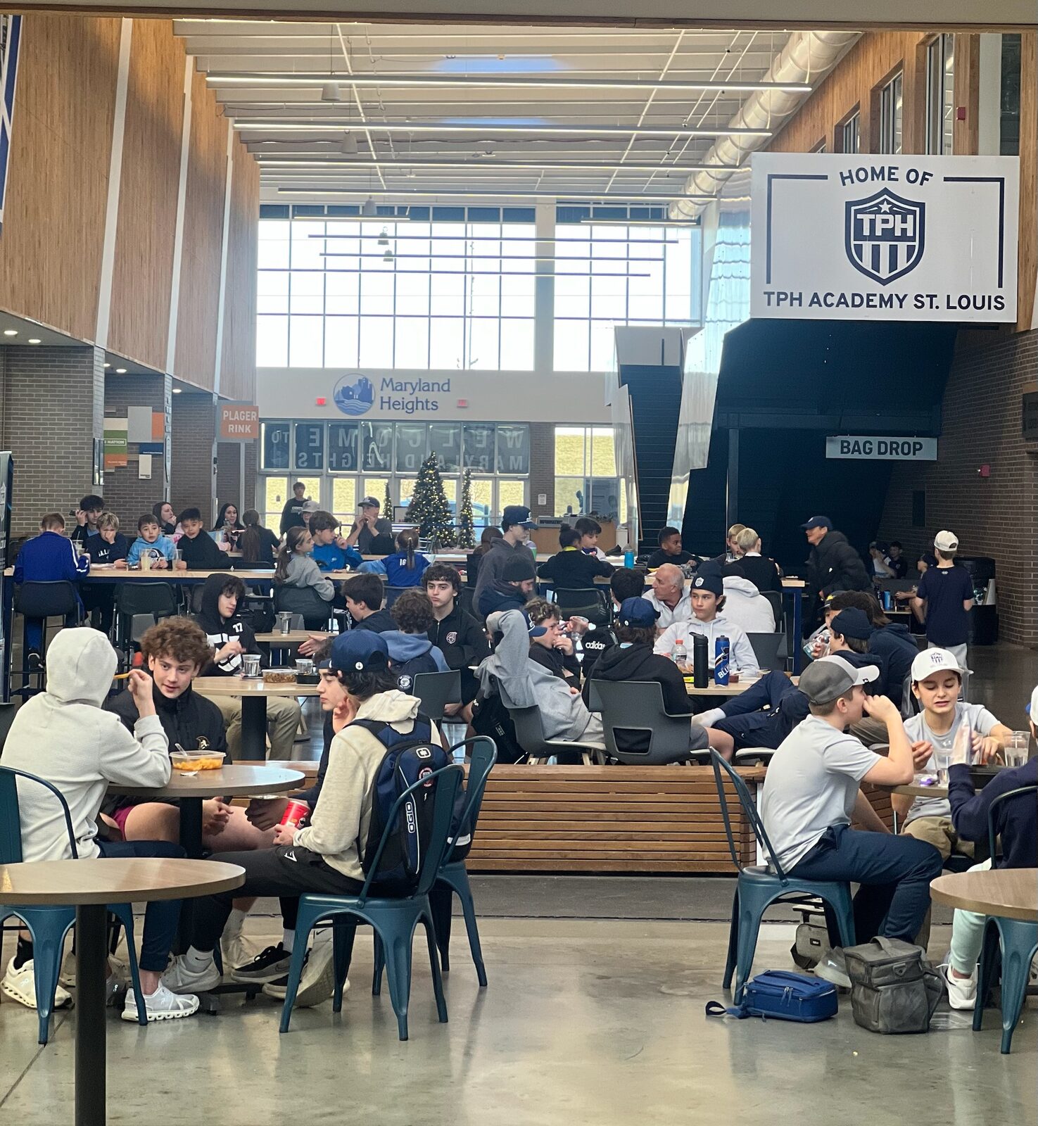Academy students at lunch tables
