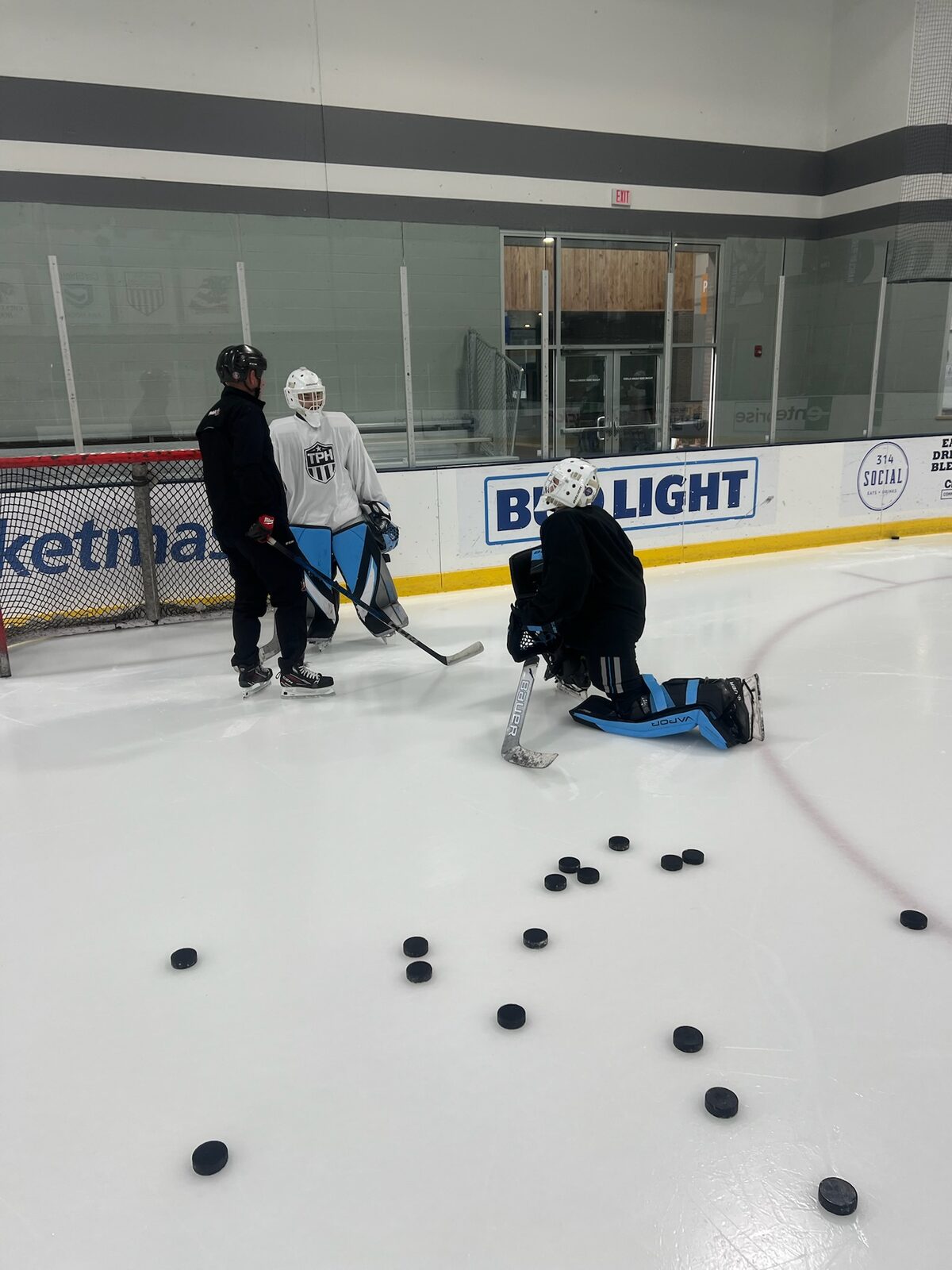 Pucks on the ice at Centene Community Ice Center