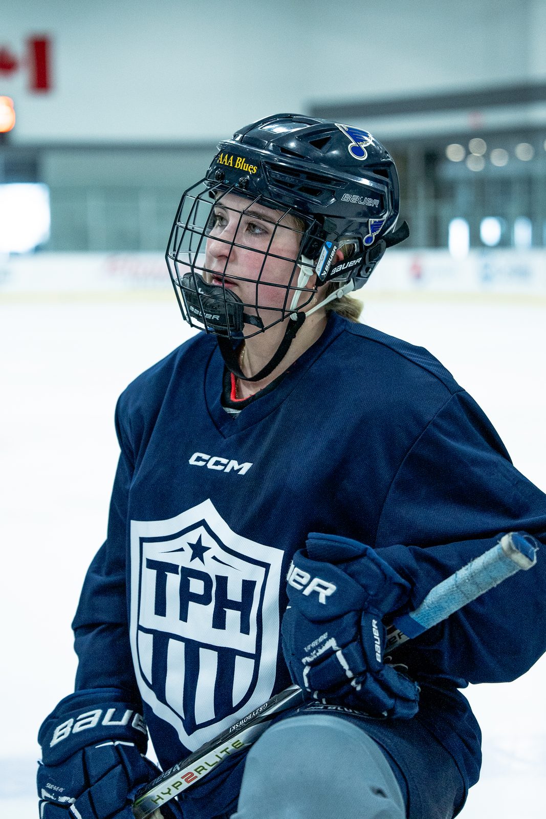 Female student-athlete in TPH practice jersey